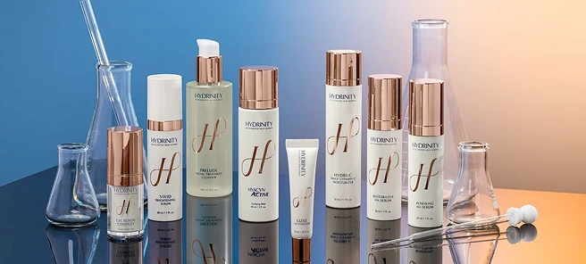 Hydrinity skincare products displayed with laboratory glassware