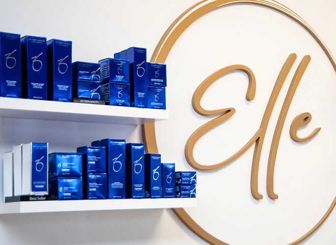 ZO Skin Health products on shelves beside the Elle Medical & Aesthetics logo