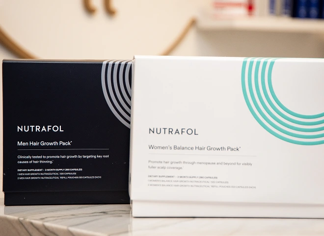 Nutrafol Men and Women's Balance Hair Growth Pack boxes