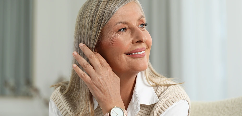 Mature woman with firm, glowing skin, representing Sublime skin tightening