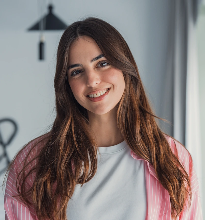 Young woman with smooth, even skin tone, representing skin tone and texture care